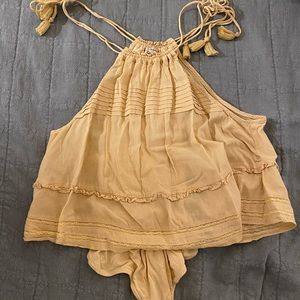 Never worn Yellow free people body suit